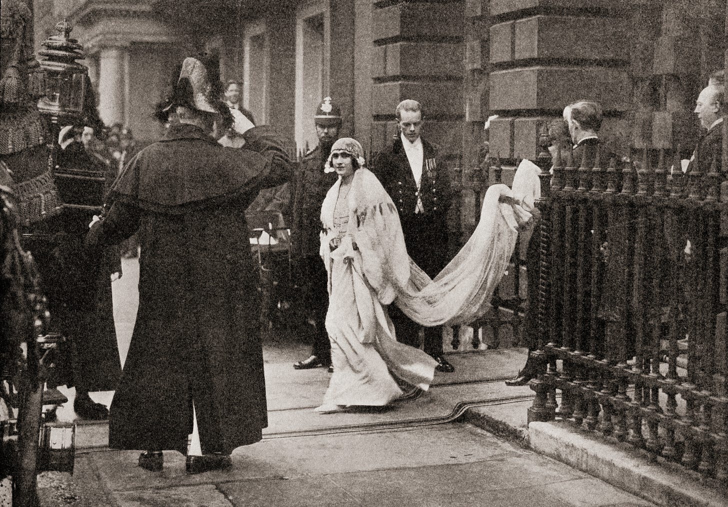 Lady Elizabeth Bowes-Lyon leaving for her wedding in her wedding dress