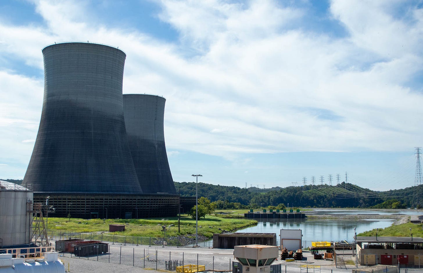 Two large concrete cooling towers rise beside the Tennessee River at the Sequoyah Nuclear Plant. Two large concrete cooling towers rise beside the Tennessee River at the Sequoyah Nuclear Plant.