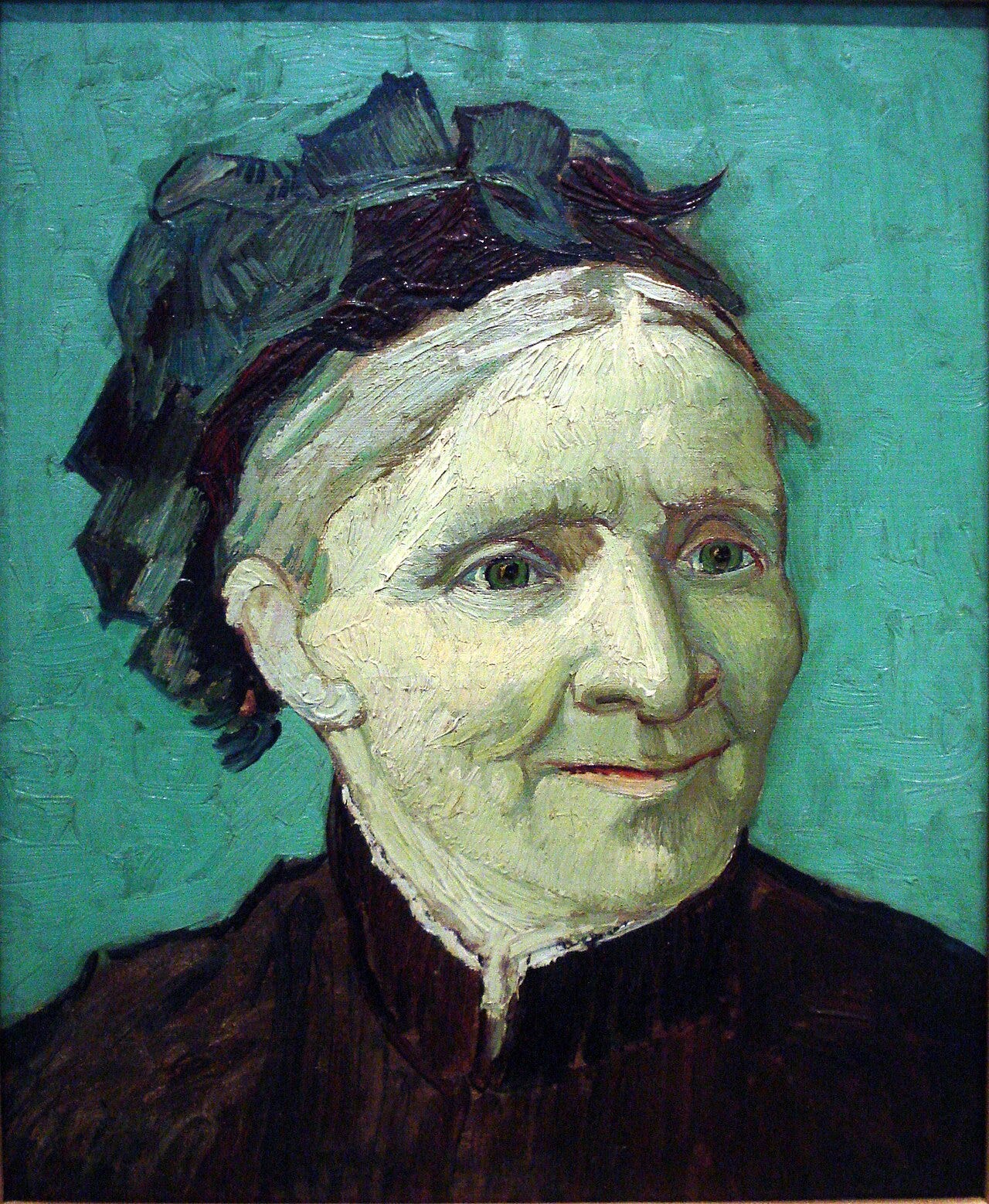 A warm color portrait of an elderly woman with green eyes A warm color portrait of an elderly woman with green eyes