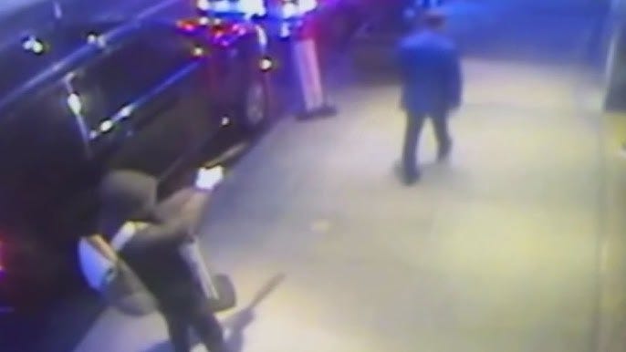 Security camera footage of the Brian Thompson shooting.