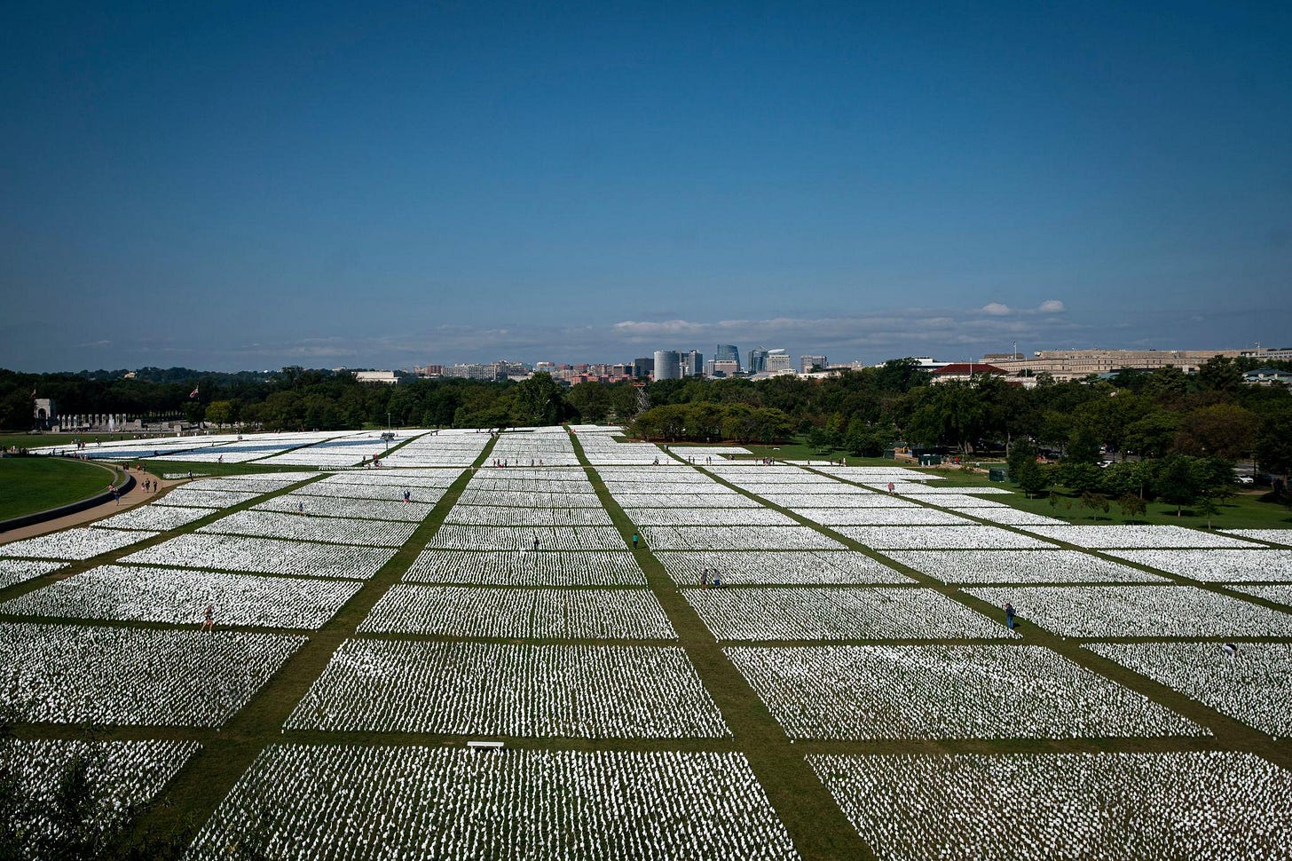 Over 650,000 White Flags Planted On National Mall To Honor American Covid Deaths Over 650,000 White Flags Planted On National Mall To Honor American Covid Deaths