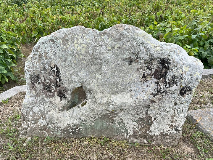 Pictures of warrior monk Benkei's footprint in a stone