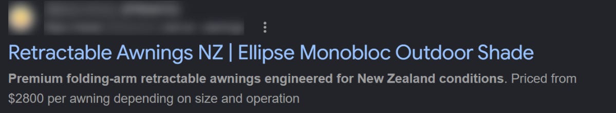 Google search result with the blue title tag line and grey description text, store name blurred