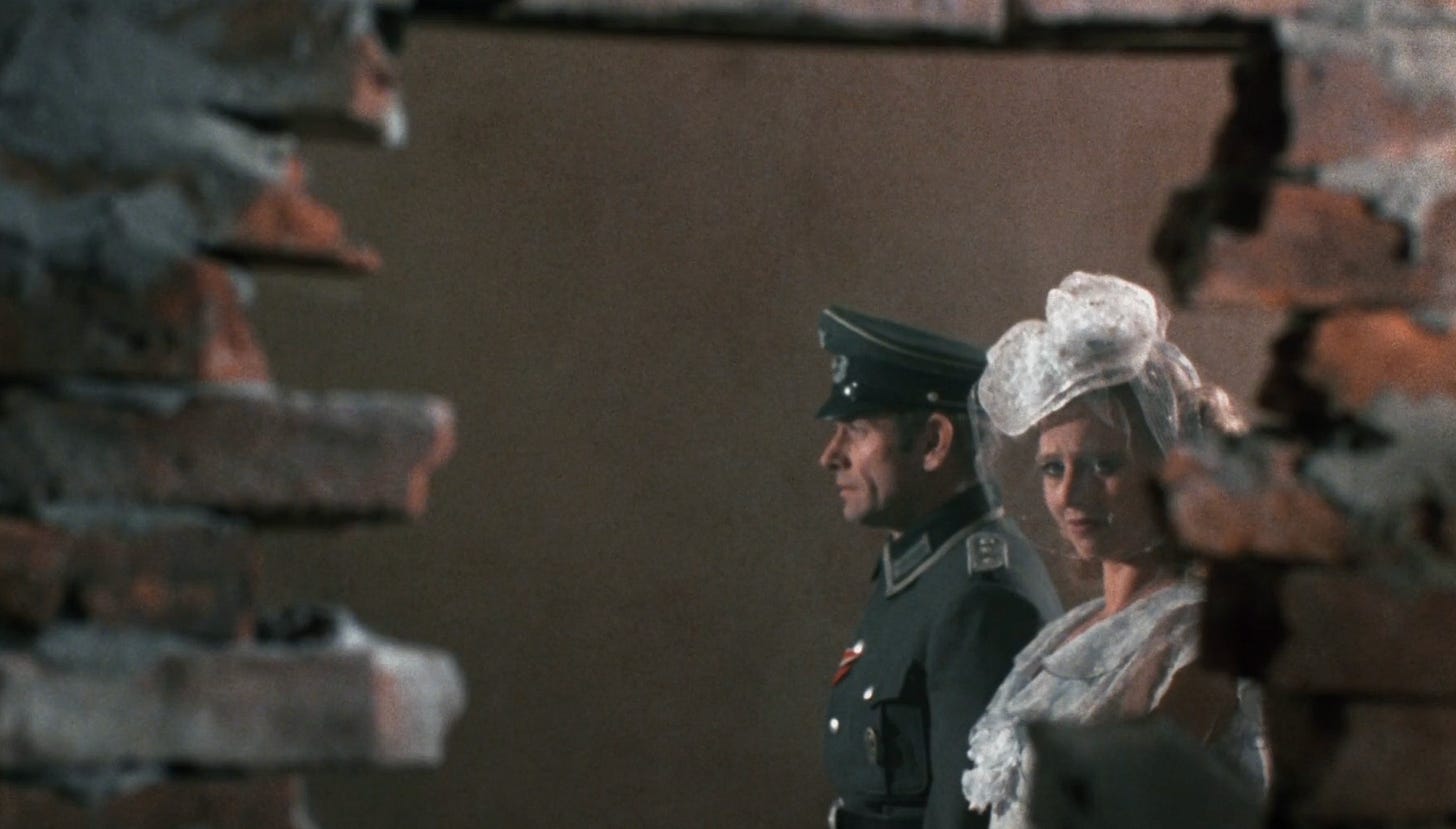 still from Fassbinder marriage of Maria Braun showing broken wall and bride