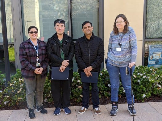 The winning team of the hackathon with the head of accessibility