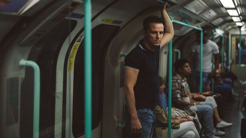 Still from the movie All of us Strangers, featuring Andrew Scott, standing in the tube carriage of the Waterloo and City line, alone. Still from the movie All of us Strangers, featuring Andrew Scott, standing in the tube carriage of the Waterloo and City line, alone.
