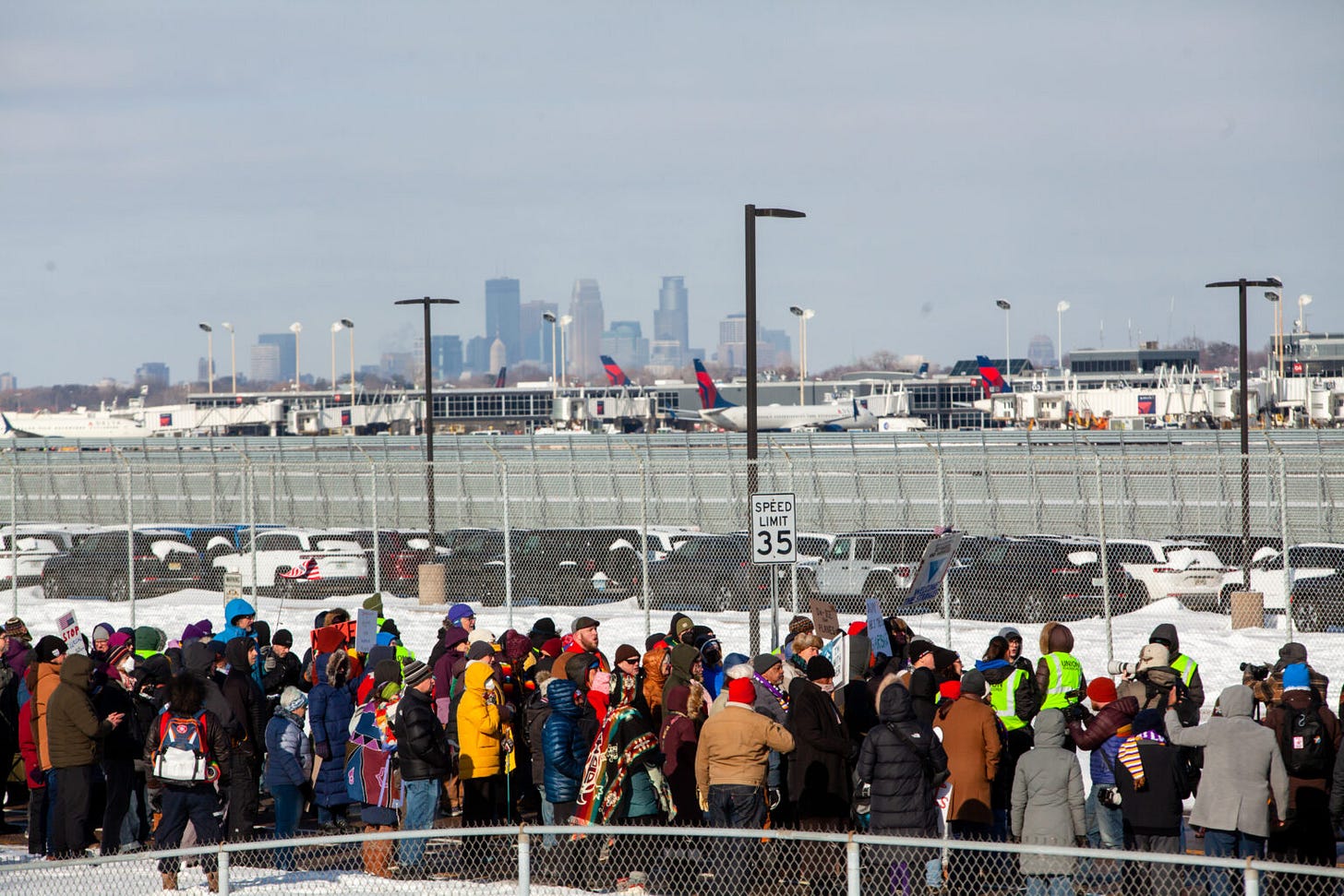 Over a hundred people rally against ICE flights outside MSP • Minnesota  Reformer