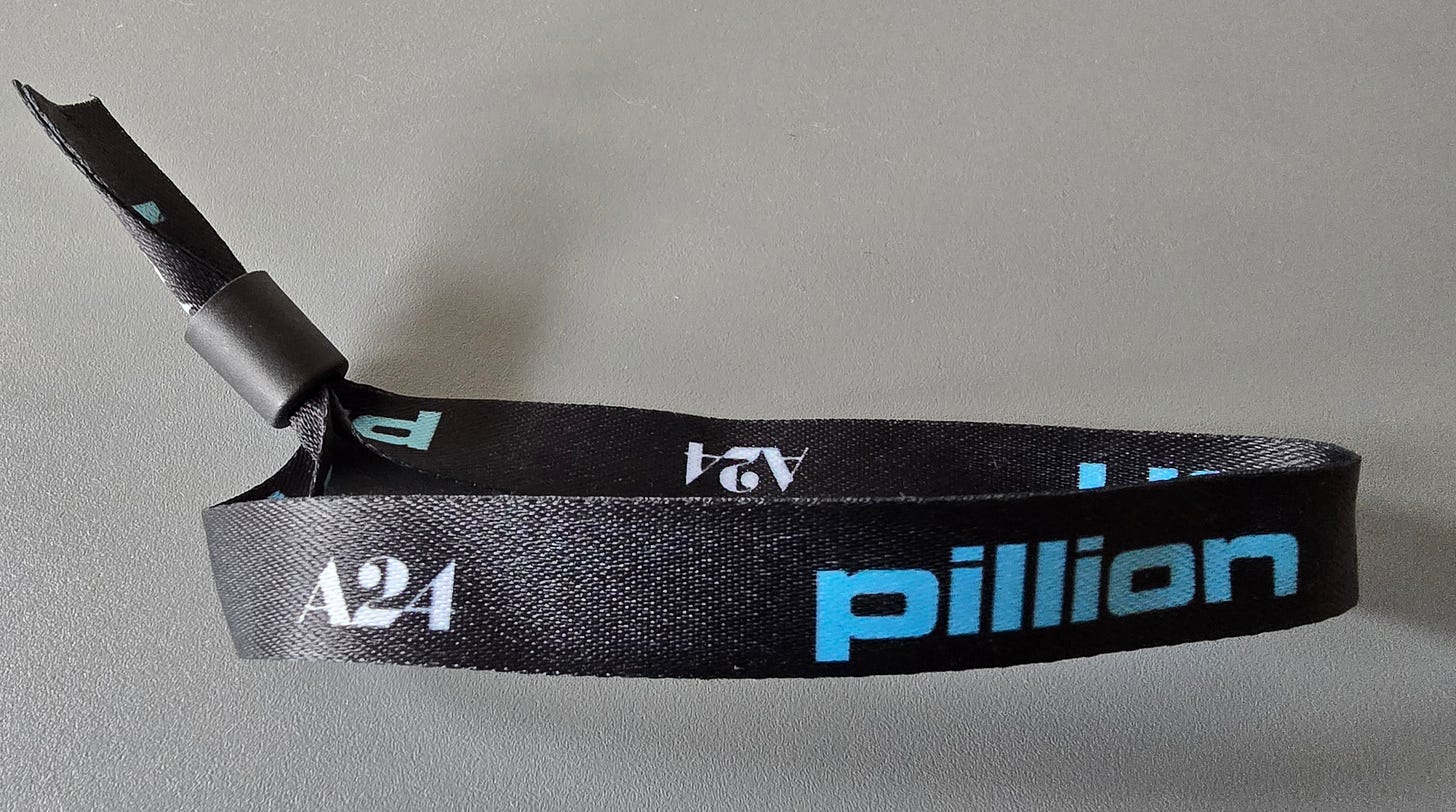 A wristband worn by attendees at the afterparty for the San Francisco premiere of the movie Pillion.