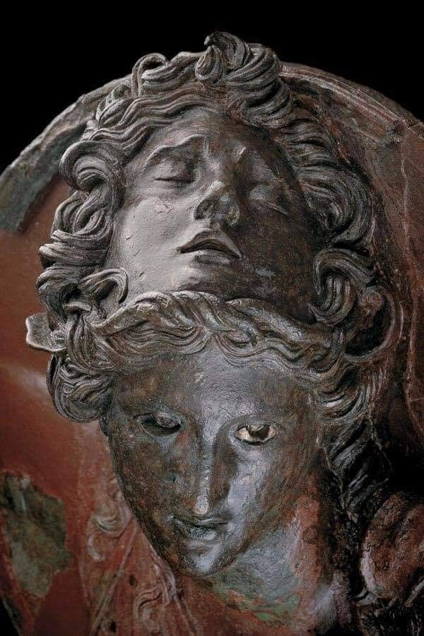 This may contain: a close up of a statue of a man's head with his eyes closed This may contain: a close up of a statue of a man's head with his eyes closed