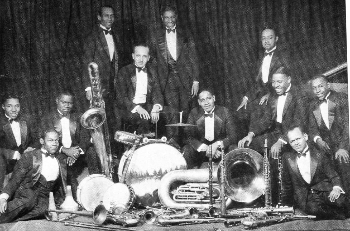 Fletcher Henderson & His Orchestra, New York, 1925. Left of the bass saxophone is a 24-year-old Louis Armstrong. Below Armstrong is 20-year-old Coleman Hawkins. Fletcher Henderson & His Orchestra, New York, 1925. Left of the bass saxophone is a 24-year-old Louis Armstrong. Below Armstrong is 20-year-old Coleman Hawkins.