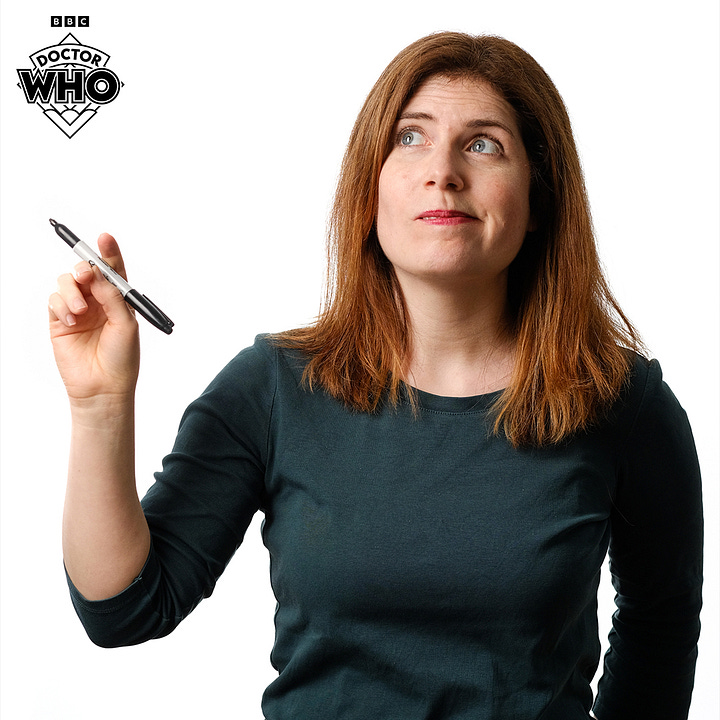 A headshot of Kate Herron where she is leaning on top of an old suitcase, and a headshot of Briony Redman where she is holding a pen in the air.