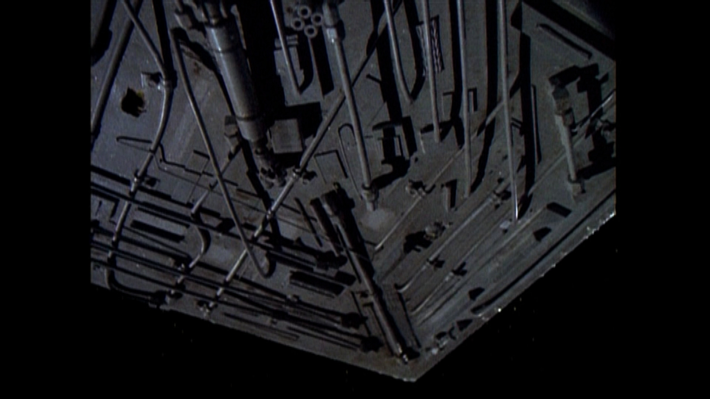 The underside of a basket a construction worker/lineman stands in to work. Also looks like an Imperial Star Destroyer from Star Wars. The underside of a basket a construction worker/lineman stands in to work. Also looks like an Imperial Star Destroyer from Star Wars.