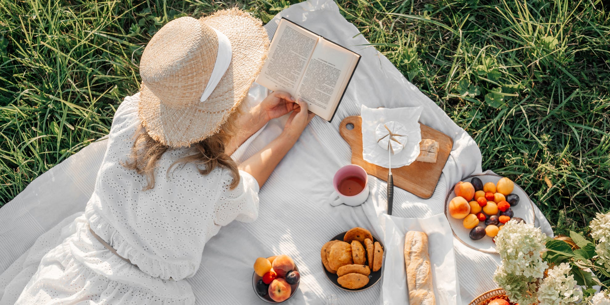 Woman reading on a picnic. Woman reading on a picnic.