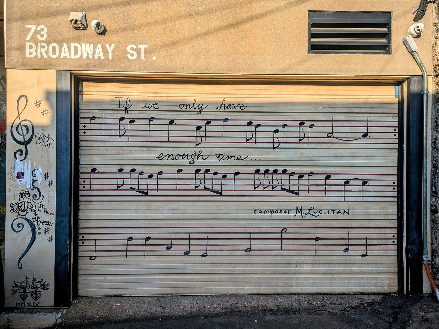 Street art in Asheville of musical notes.