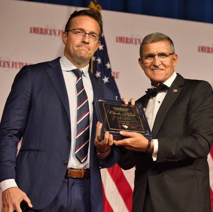 May be an image of text that says 'ANERIOINTO ANERICTY INAITI ANERI 소안스분스푸도전S 7 1 carlton_a_morris_r morris_r Ebennyjohnson receiving the America's Future Charlie Kirk Award last night from LTG Michael Flynn at Mar-a-Lago Resort.'