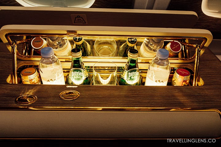 Emirates First Class Seat and mini bar.