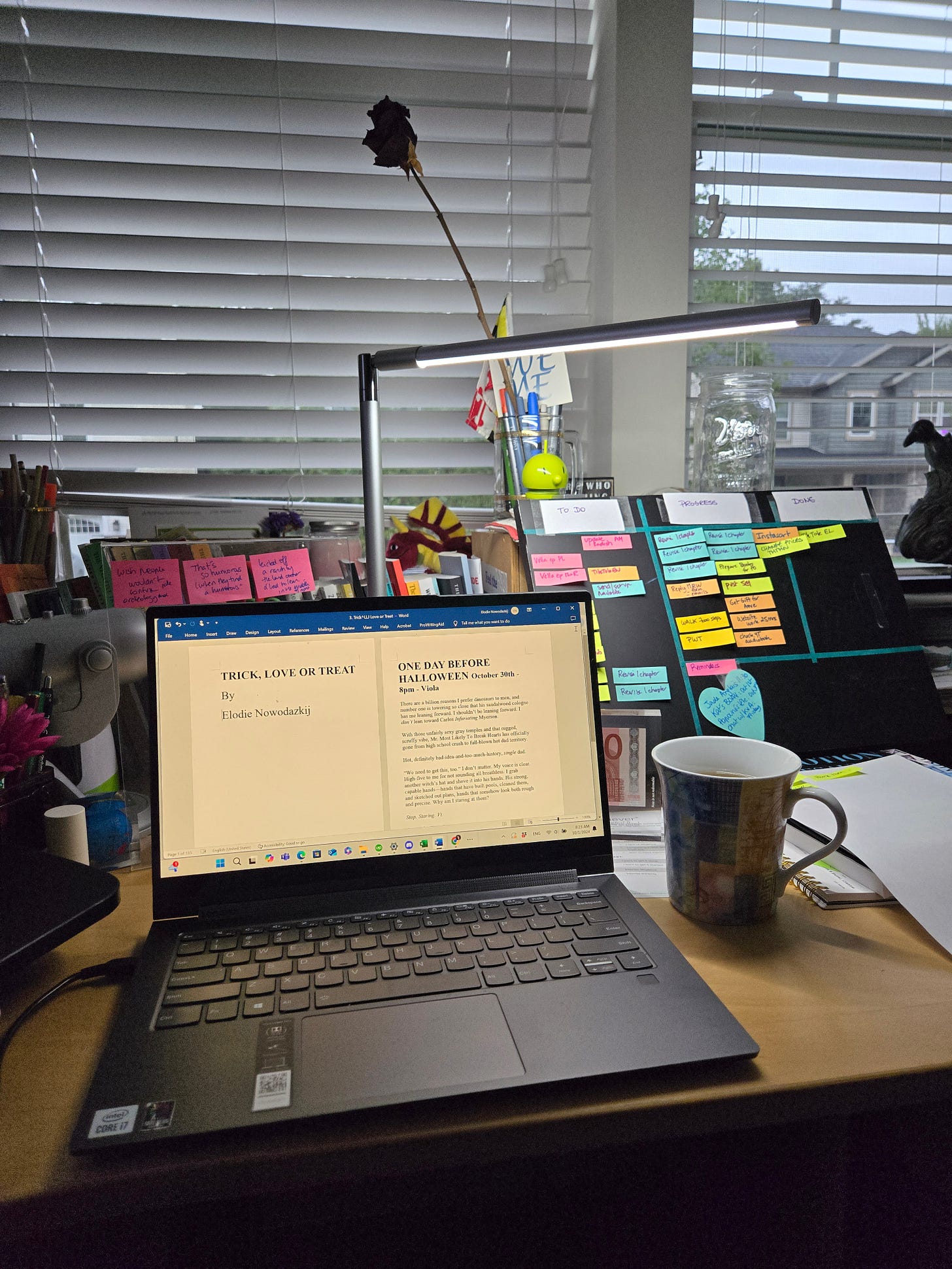 Picture of laptop with board behind
