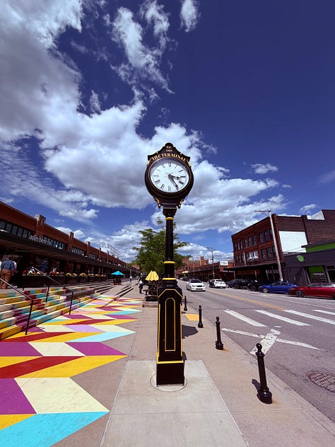 clocktower, sky, clouds, street, sign, trees