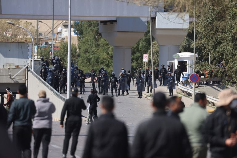 Iraqis clash with security forces as they try to approach a bridge leading to the Green Zone where the US embassy is located, in Baghdad on March 1, 2026, the morning after the US and Israel targeted Iran. Hundreds of Iraqis, many dressed in black, attempted March 1, to storm Baghdad's fortified Green Zone, where the US embassy is located, after the killing of Iran's supreme leader, Ali Khamenei. Iraqis clash with security forces as they try to approach a bridge leading to the Green Zone where the US embassy is located, in Baghdad on March 1, 2026, the morning after the US and Israel targeted Iran. Hundreds of Iraqis, many dressed in black, attempted March 1, to storm Baghdad's fortified Green Zone, where the US embassy is located, after the killing of Iran's supreme leader, Ali Khamenei.