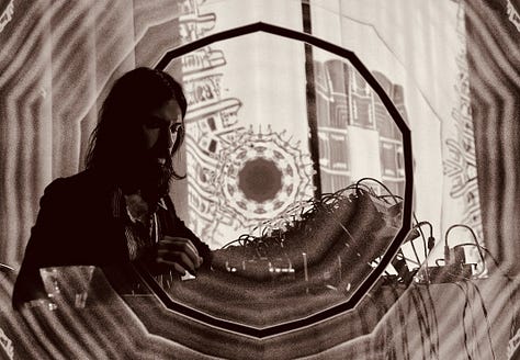 A gallery consisting of Khôra & Mas Aya's Primordial Mind album, and slow lit, vaguely psychedelic photos of the two artists.
