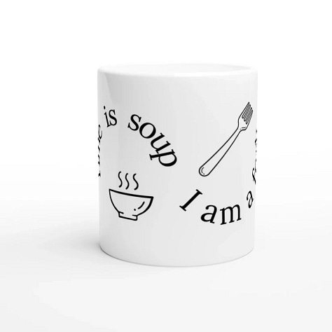images of a mug from Nocturnal Narrator's website. The mug is white and the text is black, curled around the mug. There is a doodle of a bowl of soup and a fork