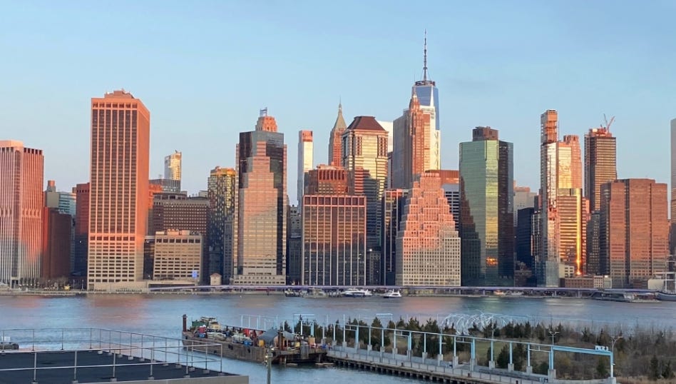 View of DUMBO in Brooklyn, New York, with the Manhattan skyline in the background View of DUMBO in Brooklyn, New York, with the Manhattan skyline in the background