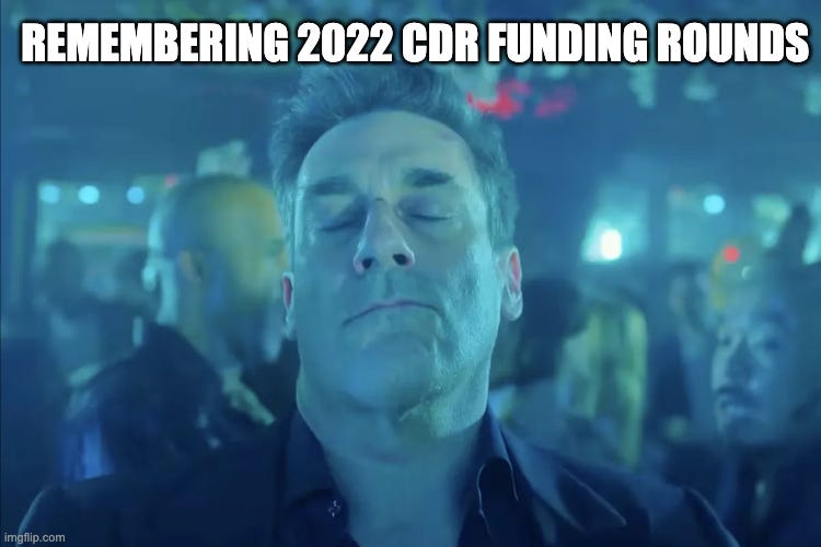 "Remembering 2022 CDR funding rounds" above a man in a nightclub with his eyes closed, lost in the memory.