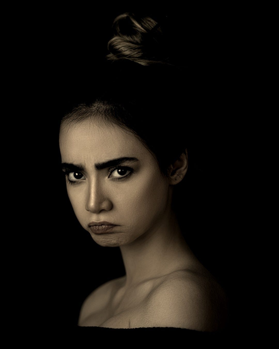 woman with brown hair and black eyes woman with brown hair and black eyes