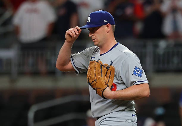 Evan Phillips of the Los Angeles Dodgers reacts after their 2-1 win against the Atlanta Braves at Truist Park on May 02, 2025 in Atlanta, Georgia.