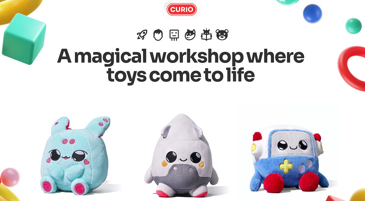 In the top center, a red curved rectangle with white font reads the word "Curio." Beneath it, the words "A magical workshop where toys come to life," and beneath that, three stuffed toys — one powder blue with raspberry spots (left), one grey and conical (center), and one blue and off-white shaped roughly like a calculator (right). 