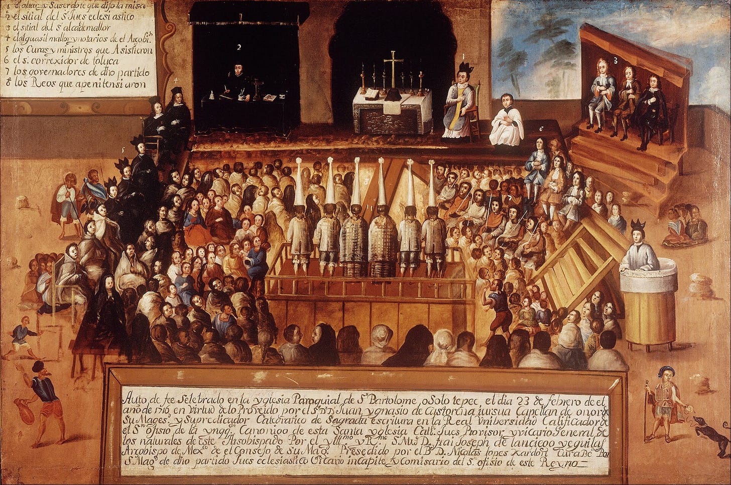 The packed interior of a village church: six figures in tall pointed caps stand on a wooden platform with their backs to us, facing an altar where a priest officiates, surrounded by clergy, officials and villagers, with a long handwritten inscription across the bottom. The packed interior of a village church: six figures in tall pointed caps stand on a wooden platform with their backs to us, facing an altar where a priest officiates, surrounded by clergy, officials and villagers, with a long handwritten inscription across the bottom.