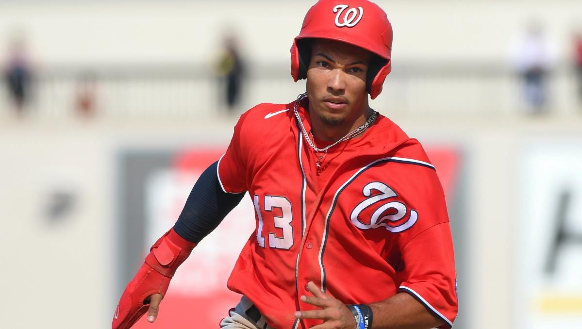 Nationals prospect Daylen Lile stretchered off after flipping into bullpen  headfirst in attempt to rob homer - Yahoo Sports