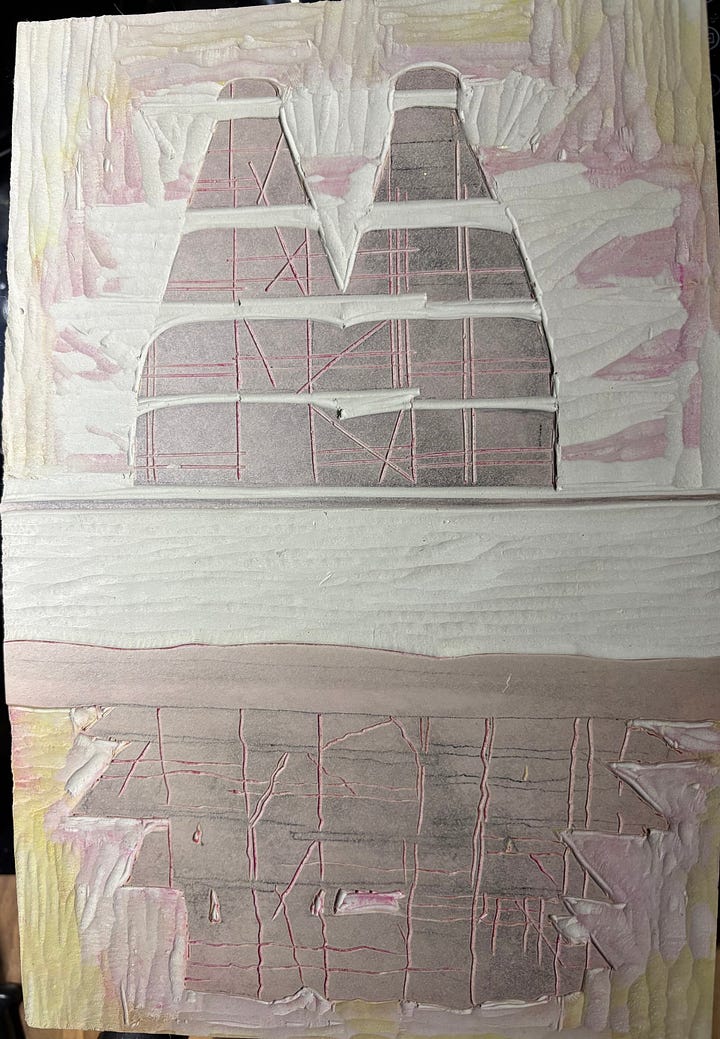 on the left, a grey block with the bottle shaped kilns and their reflections, half carved as I despaired about the mistake, and on the right me continuing to carve it a week later - one of the cutters is lying n the block, with some curls of lino as evidence of activity.