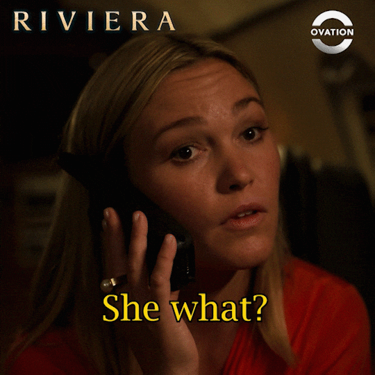 GIF of Julia Stiles, a blonde woman, talking on the telephone. The caption says "She what?"
