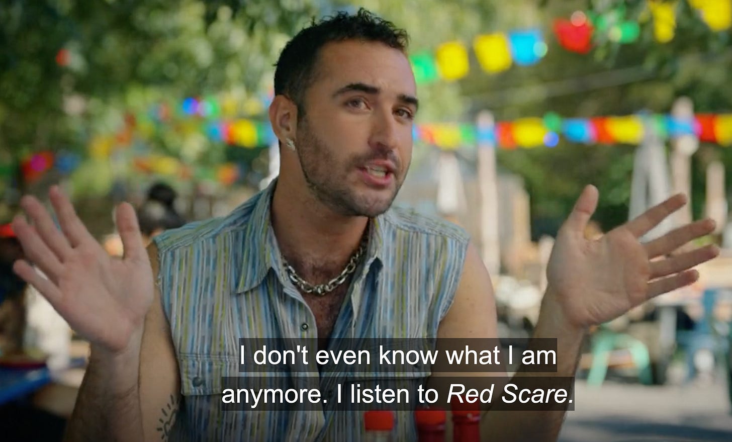 Man with caption "I don't even know what I am anymore. I listen to Red Scare"