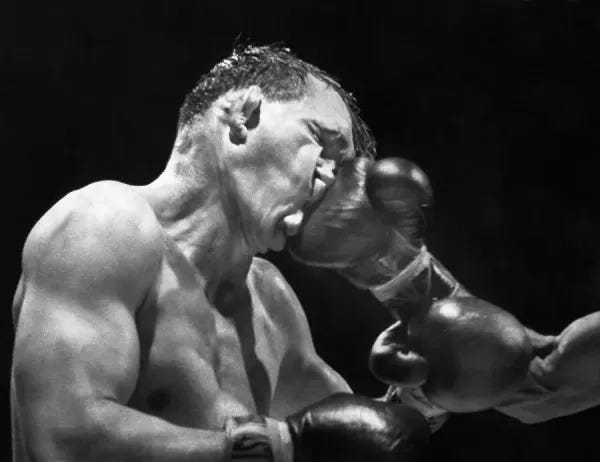 Gene Fullmer Takes Crushing Right During 1960 Boxing Match. Prints from  Fine Art Storehouse