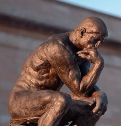 A statue of a person thinking

AI-generated content may be incorrect.
