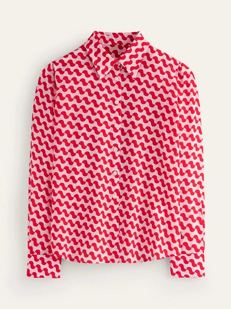 A red, white, and pink silk blouse and a navy blazer with red and white stripes. A long sleeve, long length mesh dress with multicolor squares.