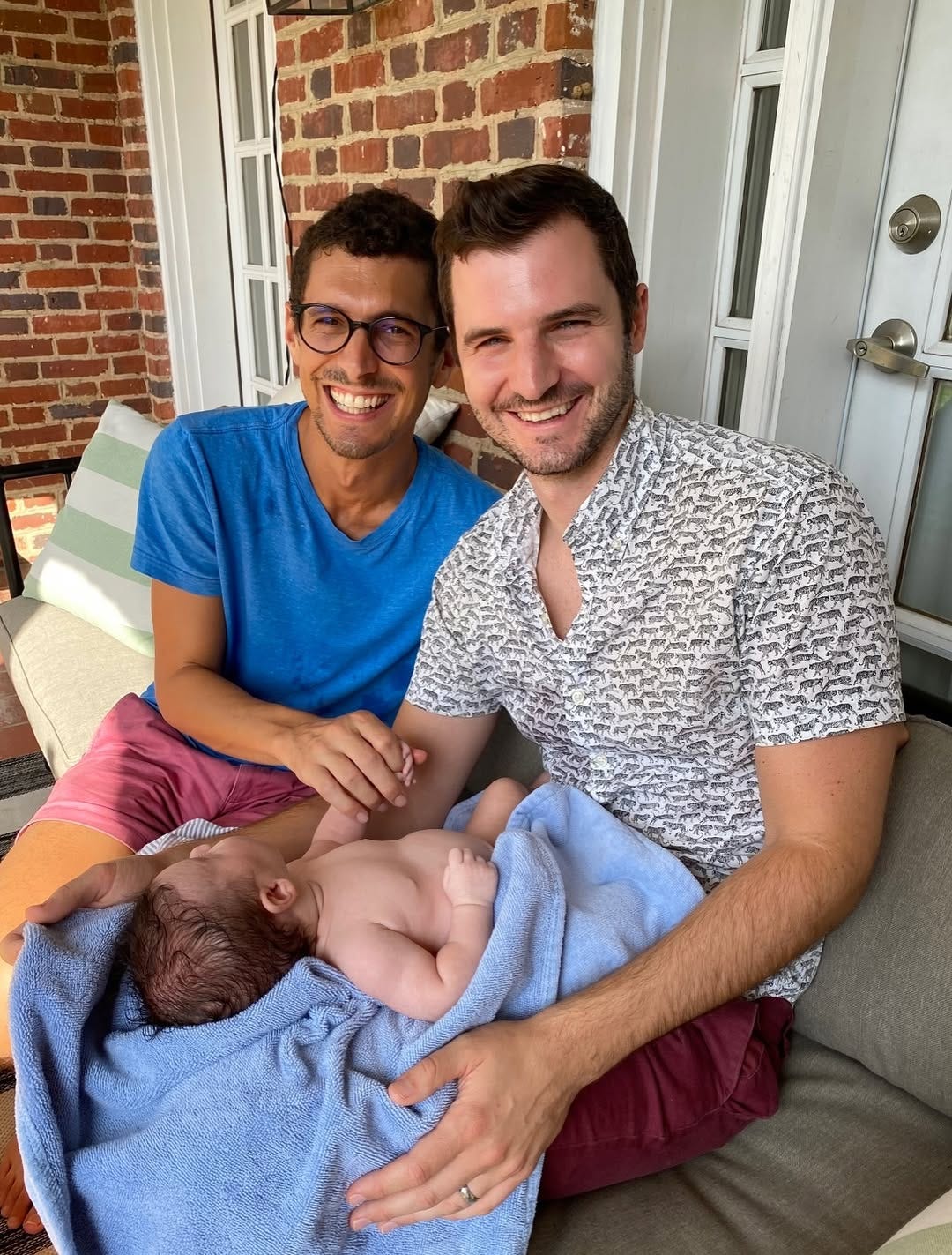 Danny, his husband Steve, and one of their daughter’s as a baby Danny, his husband Steve, and one of their daughter’s as a baby