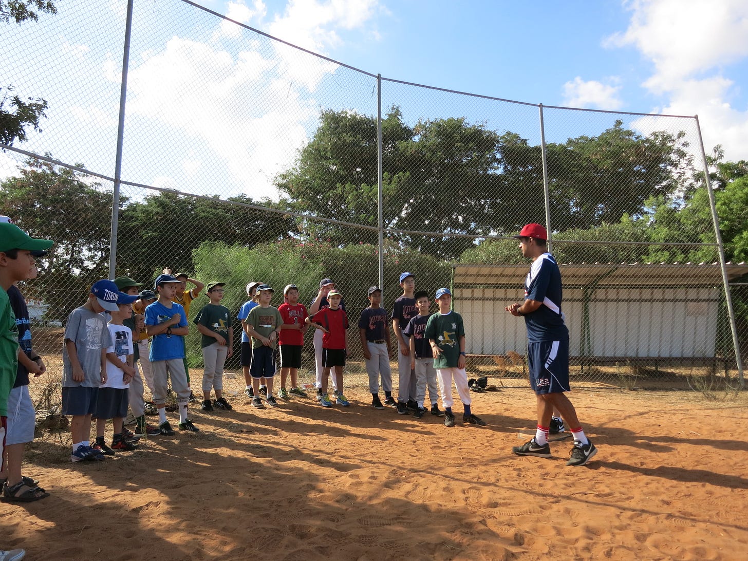 Nate Fish, King of Jewish Baseball, talking to the kids early one Succot morning.