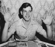 Joe Nuxhall at home in Hamilton, Ohio, showing off his major-league hands. Joe Nuxhall at home in Hamilton, Ohio, showing off his major-league hands.