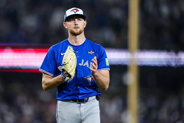Eric Lauer of the Toronto Blue Jays looks on during Game Three of the 2025 World Series presented by Capital One between the Toronto Blue Jays and...