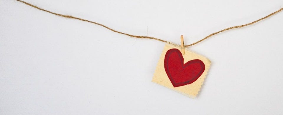 heart-shaped red and beige pendant