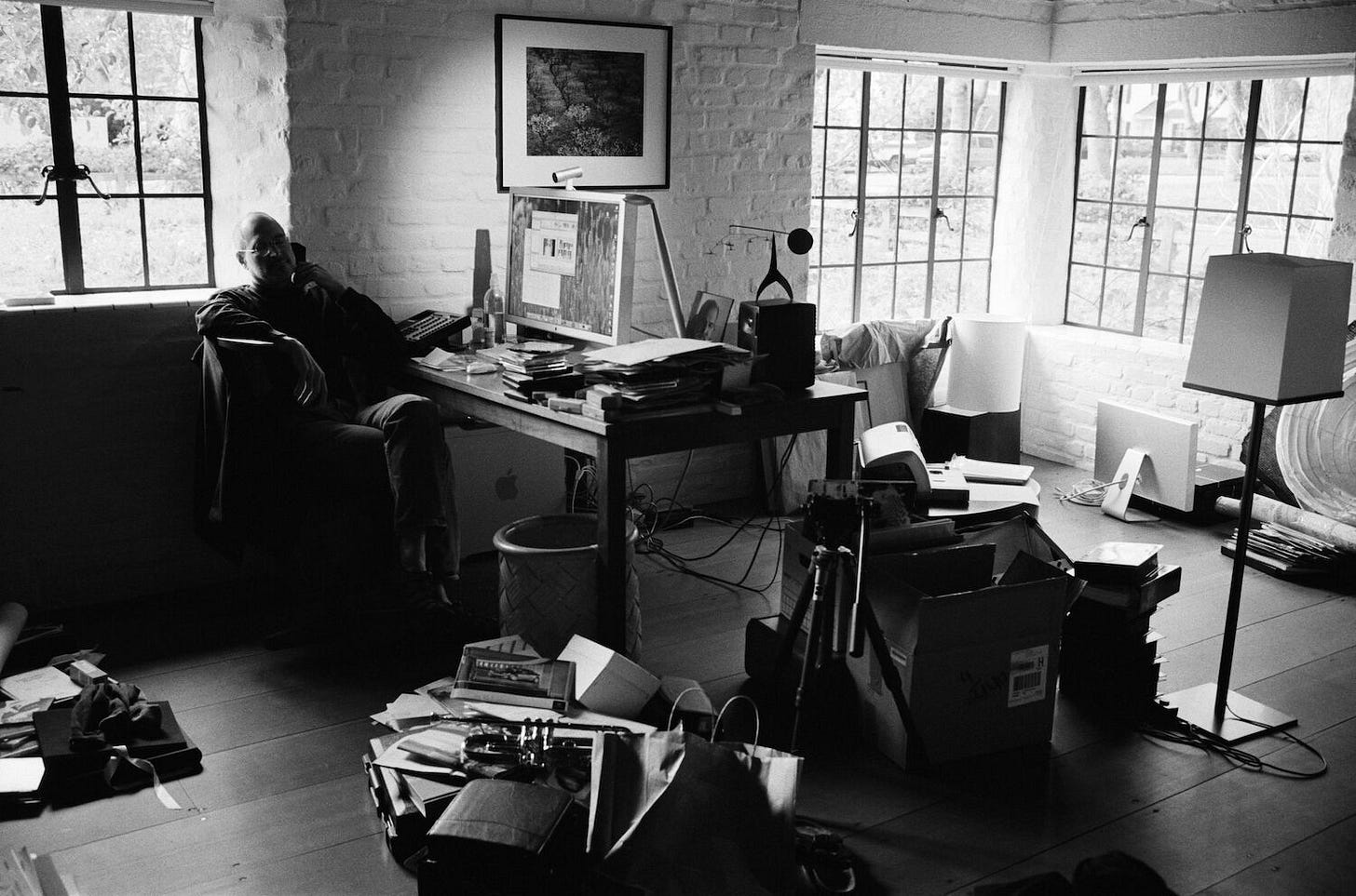 Apple co-founder Steve Jobs at work at a Moser desk. Apple co-founder Steve Jobs at work at a Moser desk.