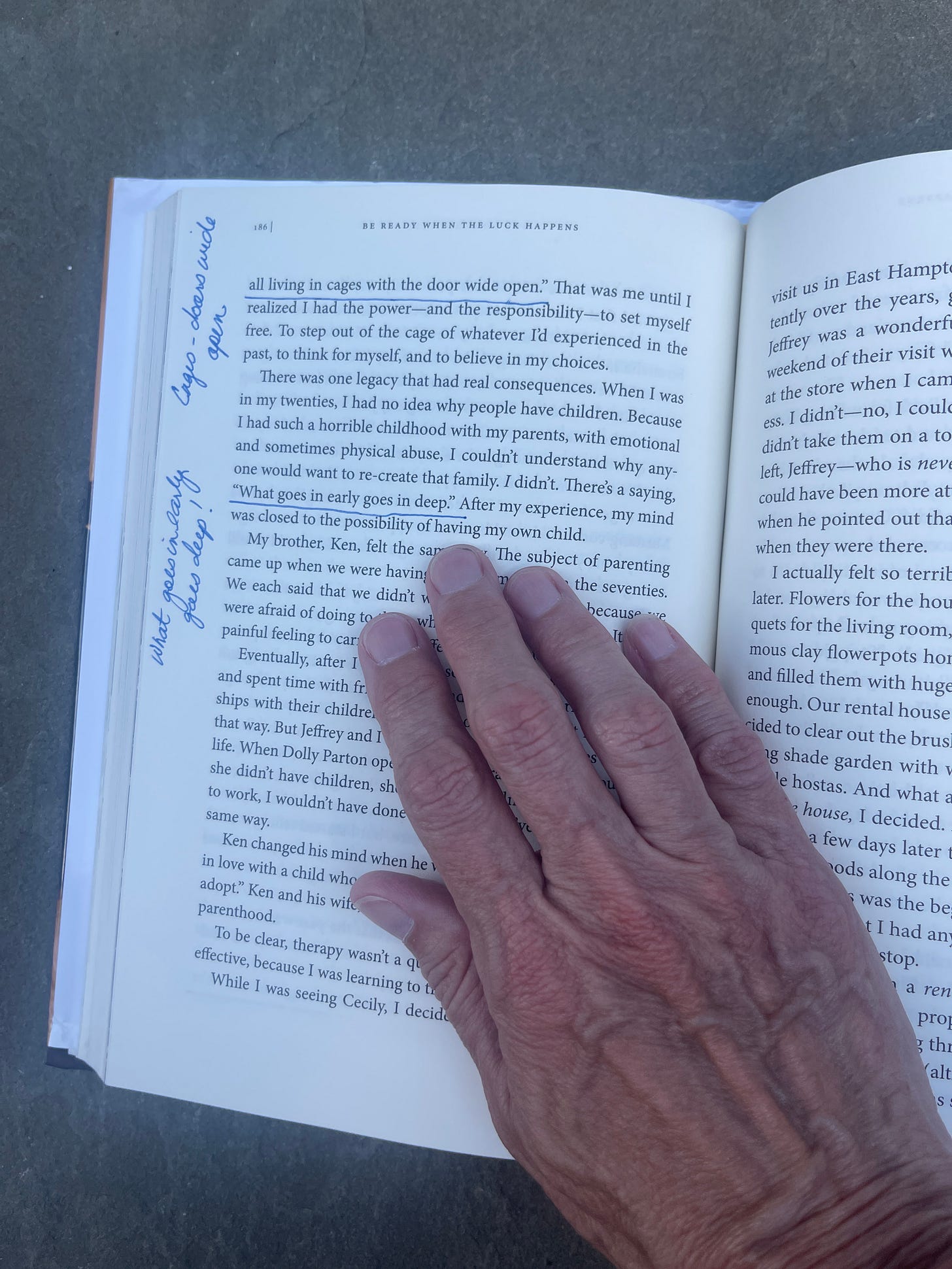 Photo of an open book showing page 180 of 'Be Ready When the Luck Happens' with a hand holding the page. The visible text includes George Lucas's quote 'We're all living in cages with the door wide open.
