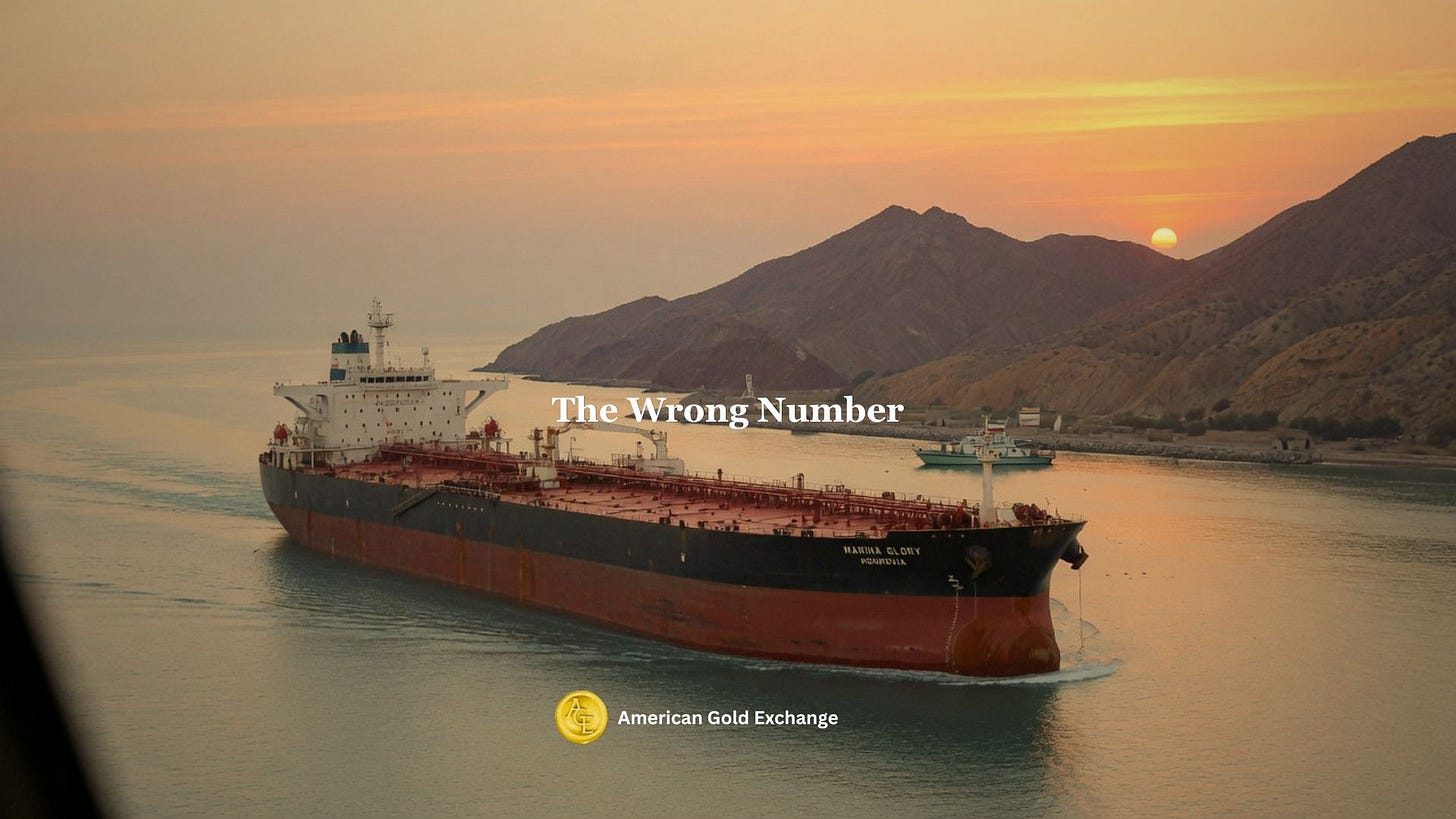 Large oil tanker sailing at sunset near mountainous coastline titled The Wrong Number Large oil tanker sailing at sunset near mountainous coastline titled The Wrong Number