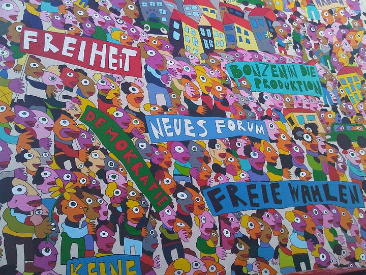 Photos of a mural from Germany and a market in Nice, France