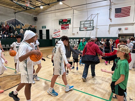 high school basketball gym tournament, spectators, crowd, players