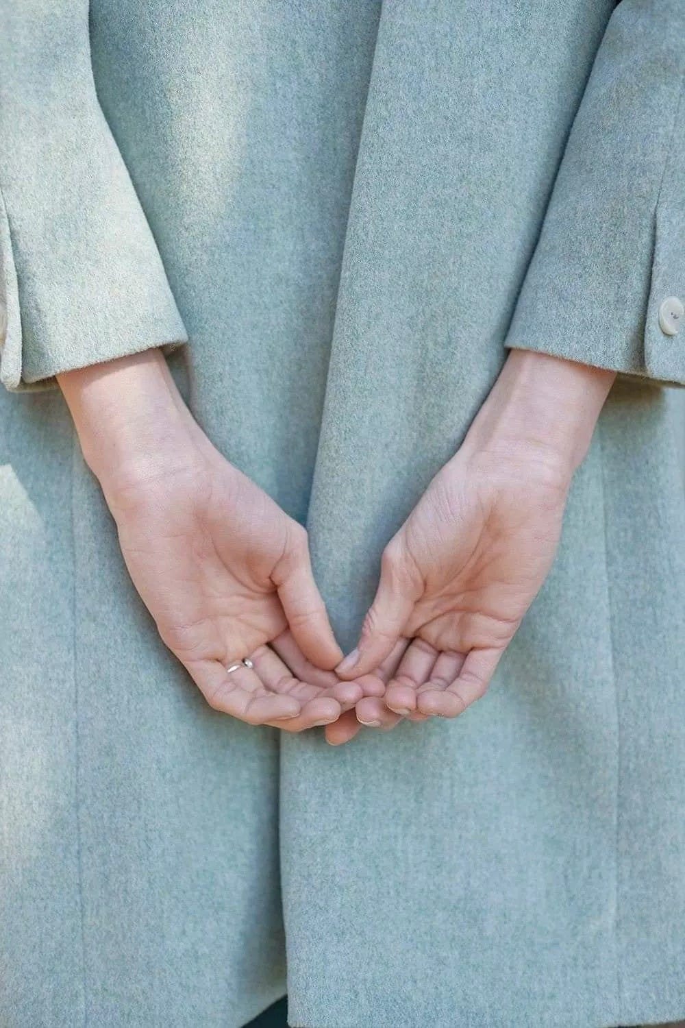 May be an image of overcoat