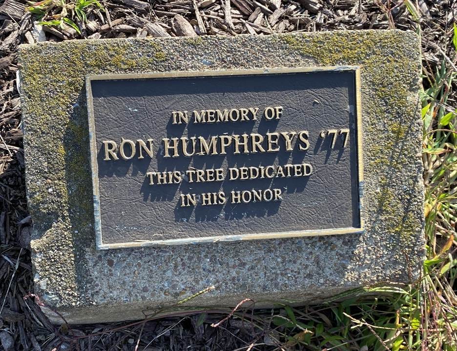 A stone plaque with text on it

AI-generated content may be incorrect.